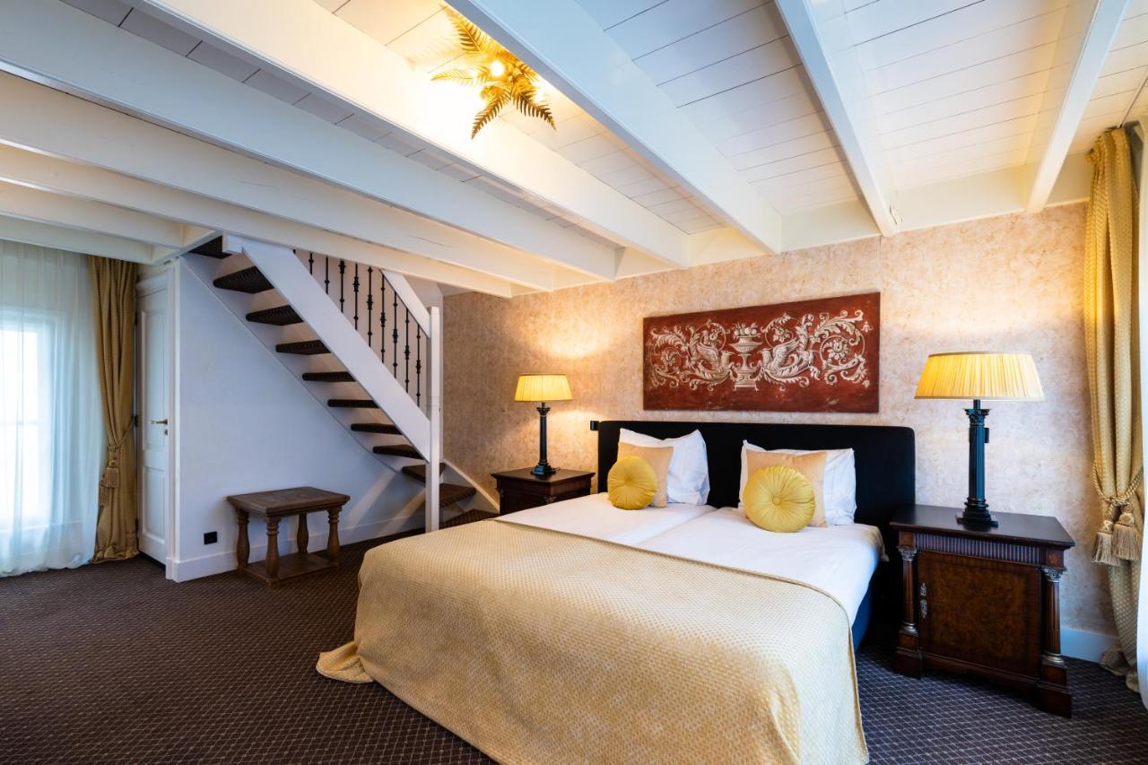 Grand Boutique Hotel-Restaurant Huis Vermeer เดเวนเตอร์ ห้อง รูปภาพ